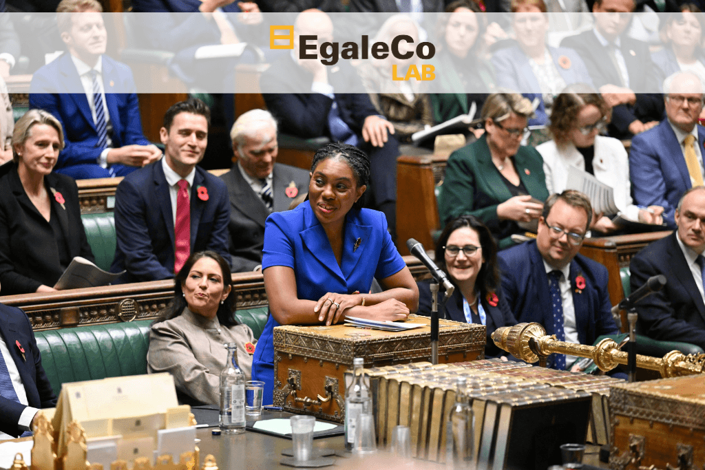 Mujer negra en el Parlamento británico, rodeada de líderes políticos. Hacia una democracia paritaria.